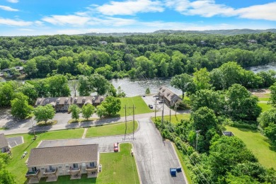Fantastic fully furnished condo just steps from Lake Taneycomo! on Pointe Royale Village Country Club in Missouri - for sale on GolfHomes.com, golf home, golf lot