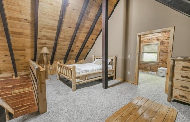 Welcome to Timber Cottage - This charming log home, built in on Apple Valley Golf Course in Ohio - for sale on GolfHomes.com, golf home, golf lot