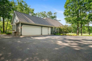 Discover architectural excellence in this stunning property on Boyne Highlands Golf Courses in Michigan - for sale on GolfHomes.com, golf home, golf lot