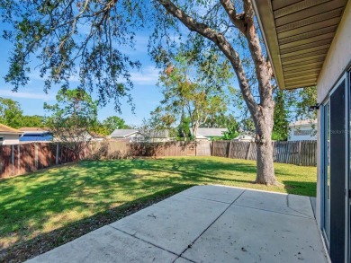 Welcome to this charming 3-bedroom, 2-bathroom home situated on on Countryside Country Club in Florida - for sale on GolfHomes.com, golf home, golf lot