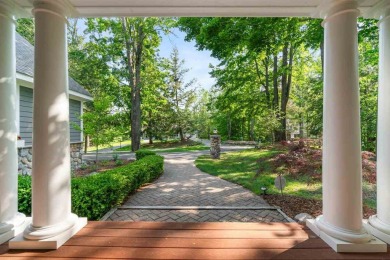 Discover architectural excellence in this stunning property on Boyne Highlands Golf Courses in Michigan - for sale on GolfHomes.com, golf home, golf lot