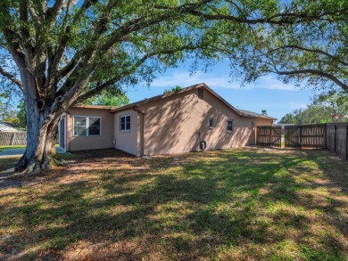 Welcome to this charming 3-bedroom, 2-bathroom home situated on on Countryside Country Club in Florida - for sale on GolfHomes.com, golf home, golf lot