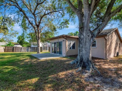 Welcome to this charming 3-bedroom, 2-bathroom home situated on on Countryside Country Club in Florida - for sale on GolfHomes.com, golf home, golf lot