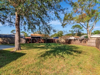 Welcome to this charming 3-bedroom, 2-bathroom home situated on on Countryside Country Club in Florida - for sale on GolfHomes.com, golf home, golf lot