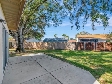 Welcome to this charming 3-bedroom, 2-bathroom home situated on on Countryside Country Club in Florida - for sale on GolfHomes.com, golf home, golf lot