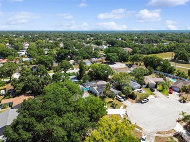 Welcome to this charming 3-bedroom, 2-bathroom home situated on on Countryside Country Club in Florida - for sale on GolfHomes.com, golf home, golf lot