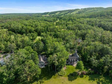 Discover architectural excellence in this stunning property on Boyne Highlands Golf Courses in Michigan - for sale on GolfHomes.com, golf home, golf lot