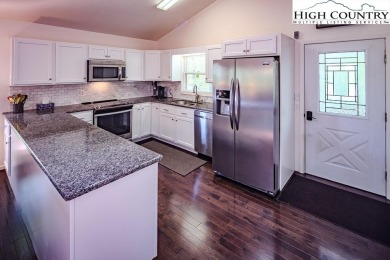 This is a wonderful updated and spacious home with long range on Land Harbor Golf Course in North Carolina - for sale on GolfHomes.com, golf home, golf lot