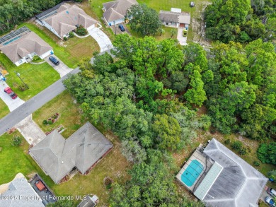 BUILD YOUR DREAM HOME on this spacious 0.40-acre CORNER lot on Oak Hills Country Club in Florida - for sale on GolfHomes.com, golf home, golf lot
