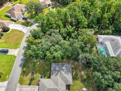 BUILD YOUR DREAM HOME on this spacious 0.40-acre CORNER lot on Oak Hills Country Club in Florida - for sale on GolfHomes.com, golf home, golf lot