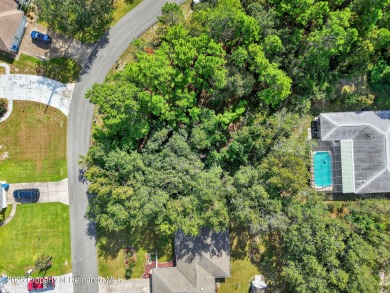 BUILD YOUR DREAM HOME on this spacious 0.40-acre CORNER lot on Oak Hills Country Club in Florida - for sale on GolfHomes.com, golf home, golf lot