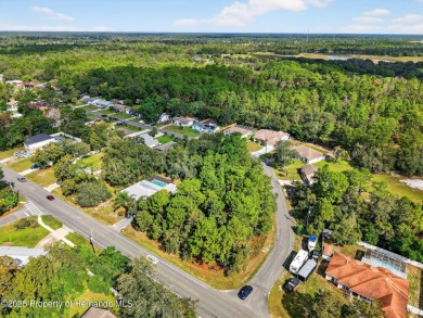BUILD YOUR DREAM HOME on this spacious 0.40-acre CORNER lot on Oak Hills Country Club in Florida - for sale on GolfHomes.com, golf home, golf lot