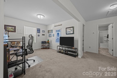 Set in Tillery Tradition, this home offers a relaxed, active on The Tillery Tradition Country Club in North Carolina - for sale on GolfHomes.com, golf home, golf lot