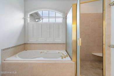 This quintessential low country style home designed by famous on Members Club At St. James Plantation in North Carolina - for sale on GolfHomes.com, golf home, golf lot