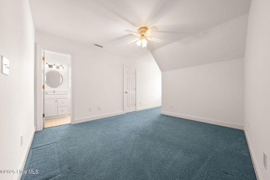 This quintessential low country style home designed by famous on Members Club At St. James Plantation in North Carolina - for sale on GolfHomes.com, golf home, golf lot