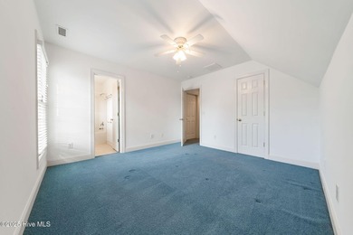 This quintessential low country style home designed by famous on Members Club At St. James Plantation in North Carolina - for sale on GolfHomes.com, golf home, golf lot