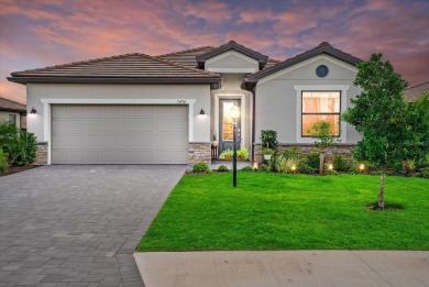 Experience the ultimate Florida lifestyle in this luxurious on Esplanade Golf and Country at Lakewood Ranch in Florida - for sale on GolfHomes.com, golf home, golf lot