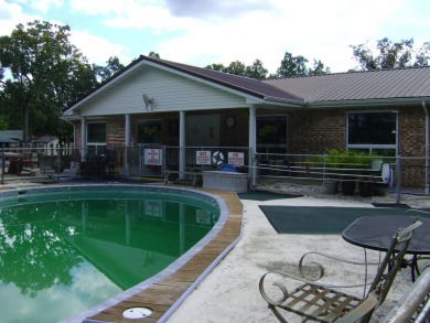 Nice remodeled manor home on the market priced to sell.  It is a on Cedar Glade Golf Course in Arkansas - for sale on GolfHomes.com, golf home, golf lot