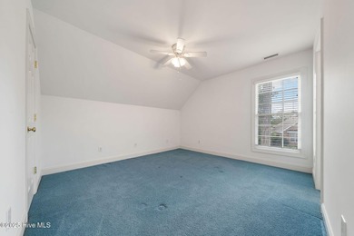 This quintessential low country style home designed by famous on Members Club At St. James Plantation in North Carolina - for sale on GolfHomes.com, golf home, golf lot