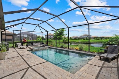 Experience the ultimate Florida lifestyle in this luxurious on Esplanade Golf and Country at Lakewood Ranch in Florida - for sale on GolfHomes.com, golf home, golf lot