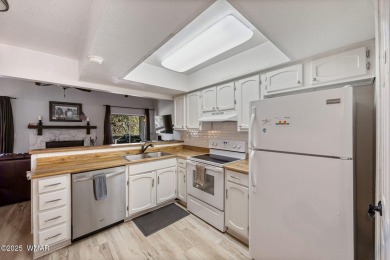 Nestled in the peaceful pines, this fully furnished 3-bedroom on Pinetop Lakes Golf and Country Club in Arizona - for sale on GolfHomes.com, golf home, golf lot
