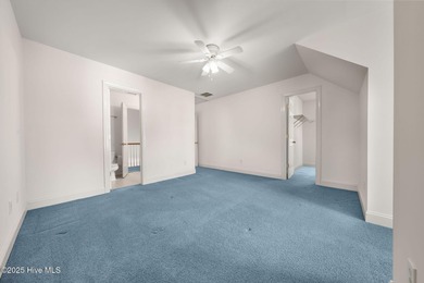 This quintessential low country style home designed by famous on Members Club At St. James Plantation in North Carolina - for sale on GolfHomes.com, golf home, golf lot