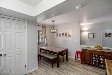 Nestled in the peaceful pines, this fully furnished 3-bedroom on Pinetop Lakes Golf and Country Club in Arizona - for sale on GolfHomes.com, golf home, golf lot