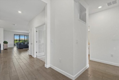 Experience the ultimate Florida lifestyle in this luxurious on Esplanade Golf and Country at Lakewood Ranch in Florida - for sale on GolfHomes.com, golf home, golf lot
