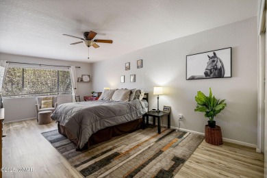 Nestled in the peaceful pines, this fully furnished 3-bedroom on Pinetop Lakes Golf and Country Club in Arizona - for sale on GolfHomes.com, golf home, golf lot