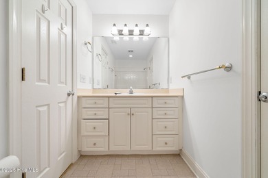 This quintessential low country style home designed by famous on Members Club At St. James Plantation in North Carolina - for sale on GolfHomes.com, golf home, golf lot