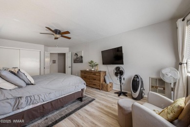 Nestled in the peaceful pines, this fully furnished 3-bedroom on Pinetop Lakes Golf and Country Club in Arizona - for sale on GolfHomes.com, golf home, golf lot