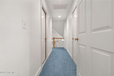 This quintessential low country style home designed by famous on Members Club At St. James Plantation in North Carolina - for sale on GolfHomes.com, golf home, golf lot