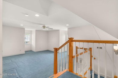 This quintessential low country style home designed by famous on Members Club At St. James Plantation in North Carolina - for sale on GolfHomes.com, golf home, golf lot