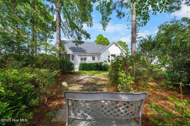 This quintessential low country style home designed by famous on Members Club At St. James Plantation in North Carolina - for sale on GolfHomes.com, golf home, golf lot