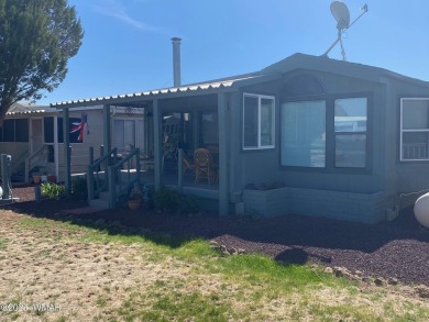 LOCATION LOCATION !   This lovely updated home is located on the on Juniper Ridge R.V. Golf Resort in Arizona - for sale on GolfHomes.com, golf home, golf lot