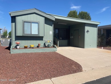 LOCATION LOCATION !   This lovely updated home is located on the on Juniper Ridge R.V. Golf Resort in Arizona - for sale on GolfHomes.com, golf home, golf lot