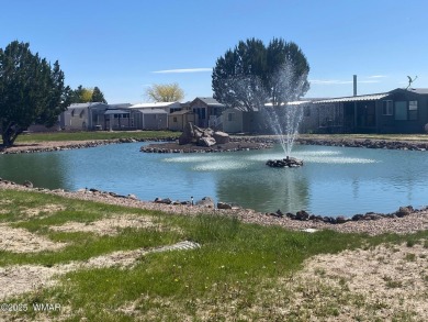 LOCATION LOCATION !   This lovely updated home is located on the on Juniper Ridge R.V. Golf Resort in Arizona - for sale on GolfHomes.com, golf home, golf lot