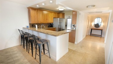 Elegant and beautifully furnished 3-bedroom, 2-bath condo in on Palm-Aire Country Club and Resort - Palms in Florida - for sale on GolfHomes.com, golf home, golf lot