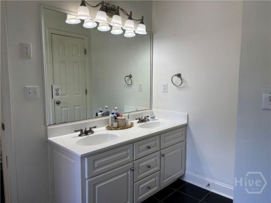 Enjoy life in this beautiful all-brick, low maintenance home in on Jennings Mill Country Club in Georgia - for sale on GolfHomes.com, golf home, golf lot