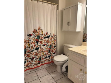 Enjoy life in this beautiful all-brick, low maintenance home in on Jennings Mill Country Club in Georgia - for sale on GolfHomes.com, golf home, golf lot