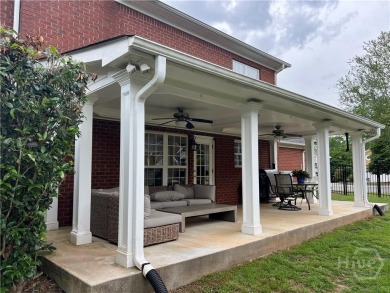Enjoy life in this beautiful all-brick, low maintenance home in on Jennings Mill Country Club in Georgia - for sale on GolfHomes.com, golf home, golf lot