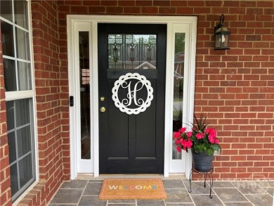 Enjoy life in this beautiful all-brick, low maintenance home in on Jennings Mill Country Club in Georgia - for sale on GolfHomes.com, golf home, golf lot