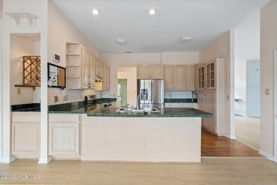 Single-Story Brick Golf Course Home with Pond View | Fairfield on Harbour Point Golf Club in North Carolina - for sale on GolfHomes.com, golf home, golf lot