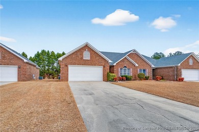 This two bedroom, two bathroom brick townhome located in the on Baywood Golf Club in North Carolina - for sale on GolfHomes.com, golf home, golf lot