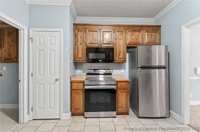 This two bedroom, two bathroom brick townhome located in the on Baywood Golf Club in North Carolina - for sale on GolfHomes.com, golf home, golf lot