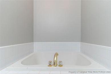 This two bedroom, two bathroom brick townhome located in the on Baywood Golf Club in North Carolina - for sale on GolfHomes.com, golf home, golf lot