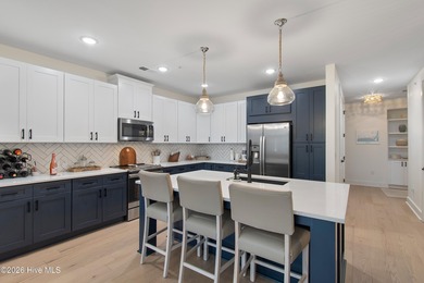 Immaculate upper-end Harborwalk condo built in 2023, offering 3 on Members Club At St. James Plantation in North Carolina - for sale on GolfHomes.com, golf home, golf lot