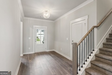 Welcome to 4306 Links Blvd, a charming ranch-style home with a on Traditions of Braselton Golf Club in Georgia - for sale on GolfHomes.com, golf home, golf lot