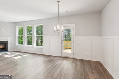 Welcome to 4306 Links Blvd, a charming ranch-style home with a on Traditions of Braselton Golf Club in Georgia - for sale on GolfHomes.com, golf home, golf lot