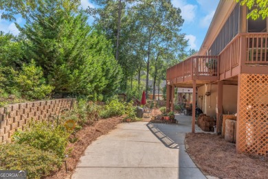 Welcome to your dream home-a true Southern Charmer nestled in on Eagles Landing Country Club in Georgia - for sale on GolfHomes.com, golf home, golf lot